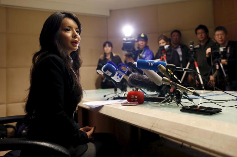 Miss World Canada Anastasia Lin speaks during a news conference in Hong Kong, China